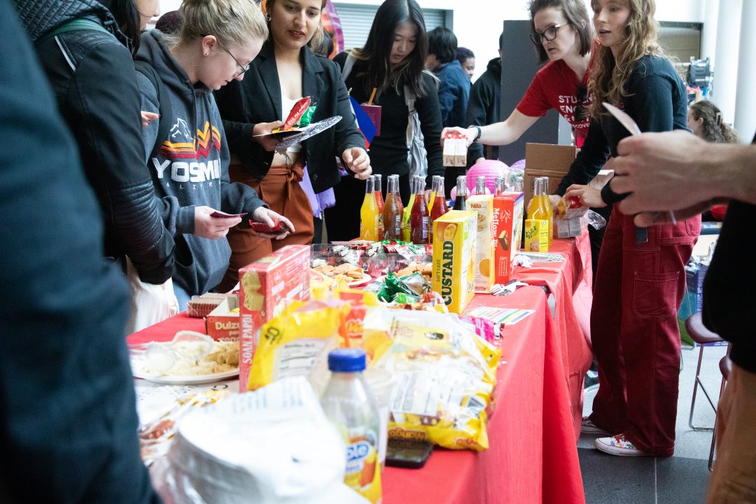 Students lining up at the 22nd annual Strawberry Festival and Diversity Day event for strawberry-inspired food items. The festivities were held on May 3 in the SAC. BRITTNEY DIETZ/THE STATESMAN