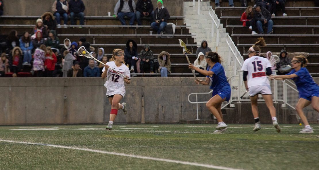 Midfielder Ellie Masera (left) carries the ball while attacker Morgan Mitchell (right) looks to get open. Masera was an All-American this year, while Mitchell was an All-CAA selection. BRITTNEY DIETZ/THE STATESMAN