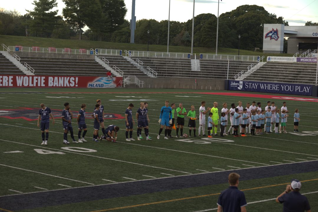The Stony Brook mens soccer team lines up for the national anthem before a game against Yale on Sept. 20, 2022. The Seawolves brought in several new players this past offseason to help them for this upcoming season. MACKENZIE YADDAW/THE STATESMAN
