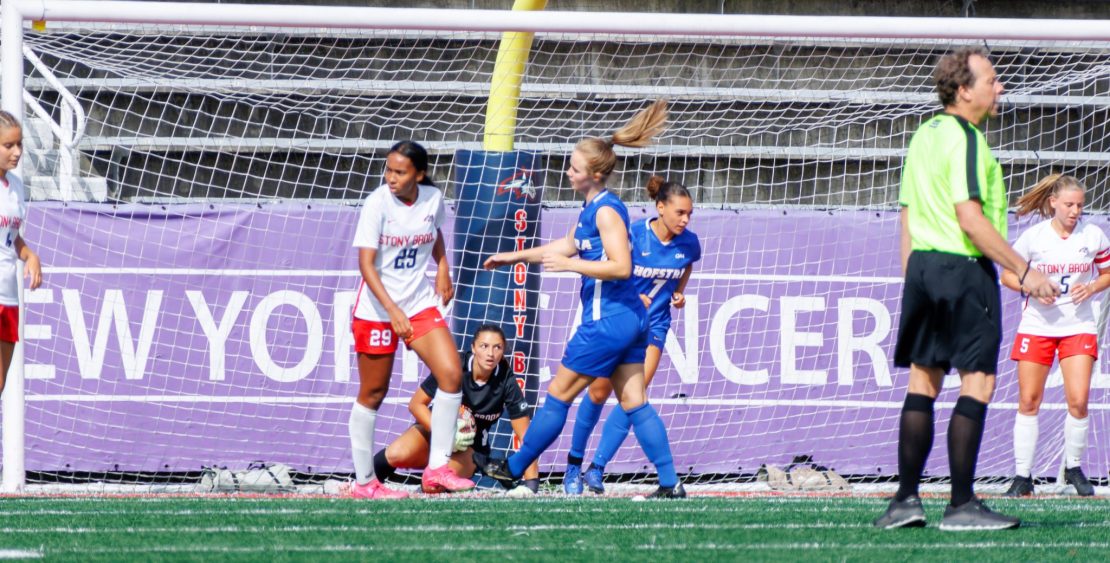 Goalkeeper Nicolette Pasquarella (background) saves a shot against Hofstra on Sunday, Sept. 17. Pasquarella made eight saves in a loss to Monmouth on Sunday. STANLEY ZHENG/THE STATESMAN