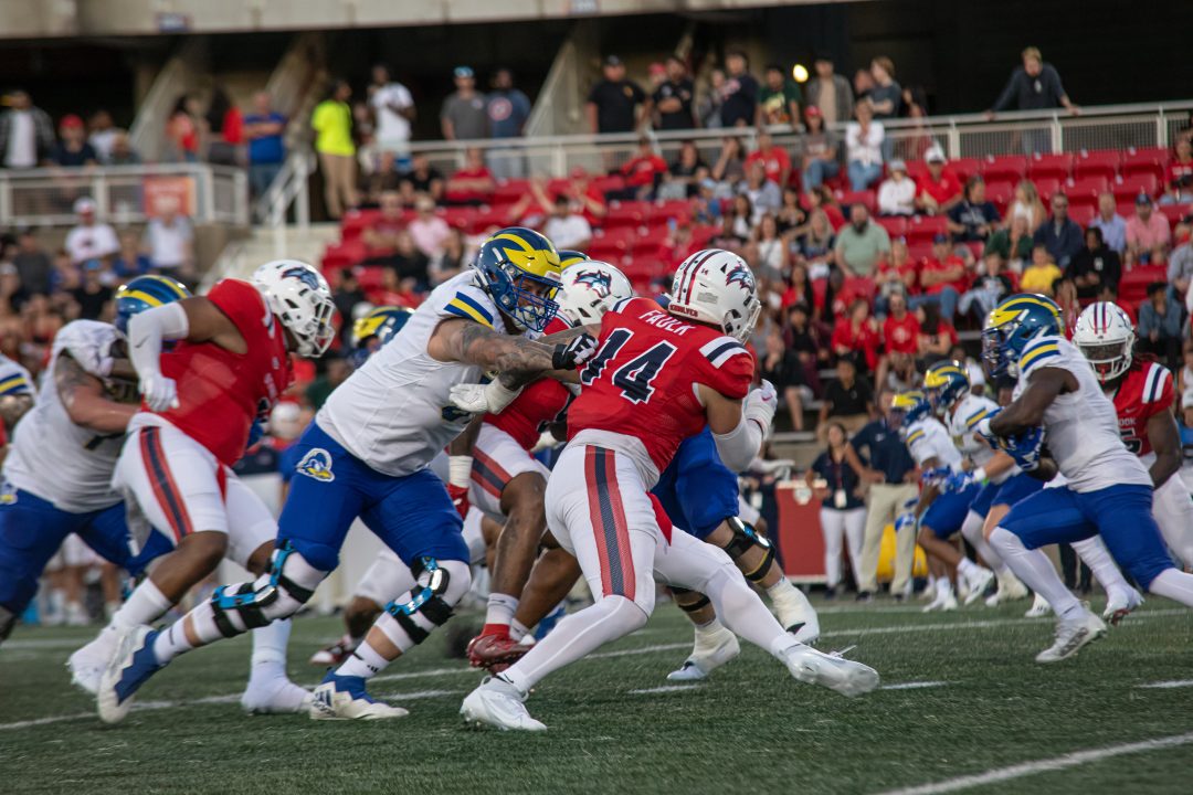 Defensive end Rodney Faulk rushes the passer against Delaware on Aug. 31. The Stony Brook football teams defensive line has a good matchup versus Richmond this week. TIM GIORLANDO/THE STATESMAN