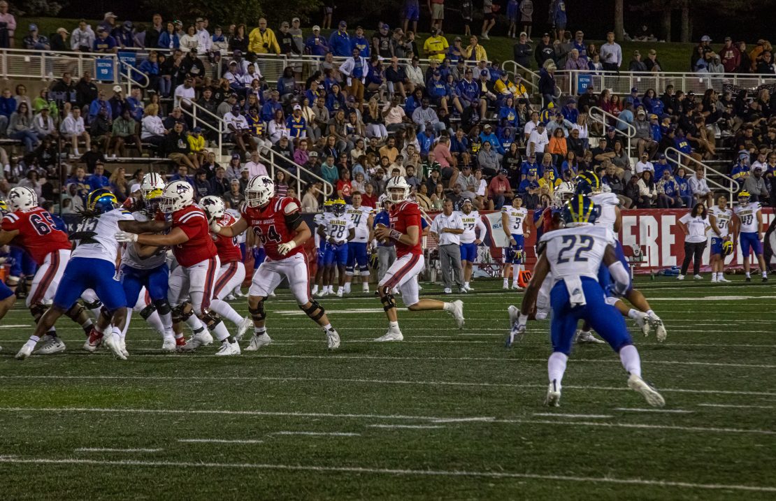 The Stony Brook football teams offensive line gives quarterback Casey Case a clean pocket to throw from against Delaware on Aug. 31. The Seawolves linemen are off to a hot start in 2023. TIM GIORLANDO/THE STATESMAN