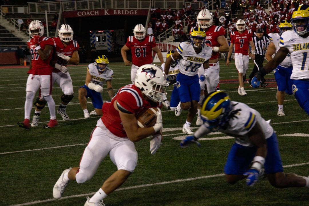 Running back Ross Tallarico turns the corner against Delaware on Aug. 31. Tallarico rushed for 42 yards on Saturday at Arkansas State. TIM GIORLANDO/THE STATESMAN