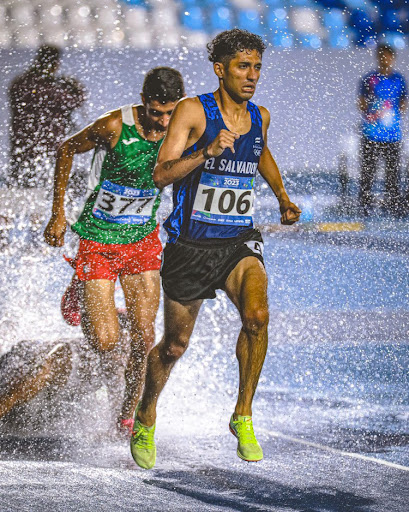 Carlos Santos Jr. (foreground) runs in the 2023 Central American and Caribbean Games. Santos Jr. earned a bronze medal in the competition. PHOTO COURTESY OF THE EL SALVADORAN NATIONAL OLYMPIC TEAM