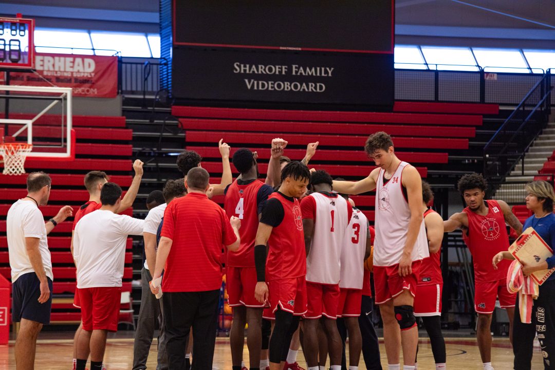 The Stony Brook mens basketball team breaks a huddle at practice on Sunday, Oct. 15. The Seawolves are looking to bounce back after a rough 2022-23 season. BRITTNEY DIETZ/THE STATESMAN