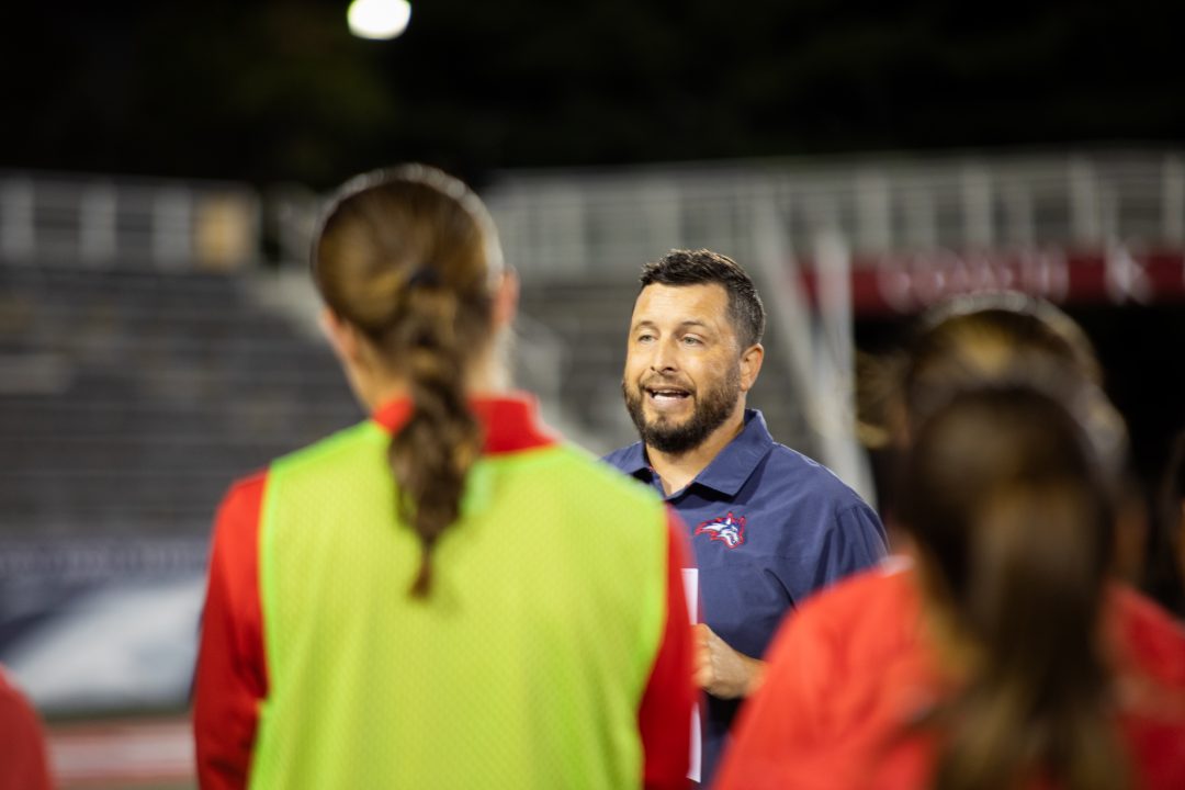 Head coach Tobias Bischof talks to his team after a match against Delaware on Sept. 14. Bischof has led his team to the playoffs for the fourth time in five years and is looking for his first-ever win in the Coastal Athletic Association postseason. BRITTNEY DIETZ/THE STATESMAN