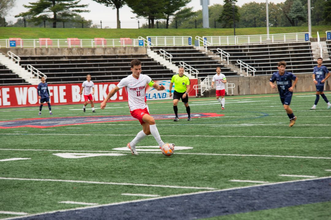 Forward Jonas Bickus takes the ball into the University of North Carolina Wilmingtons third of the pitch on Saturday, Sept. 30. Bickus led the Stony Brook mens soccer team with three shots on Tuesday at Seton Hall. MACKENZIE YADDAW/THE STATESMAN