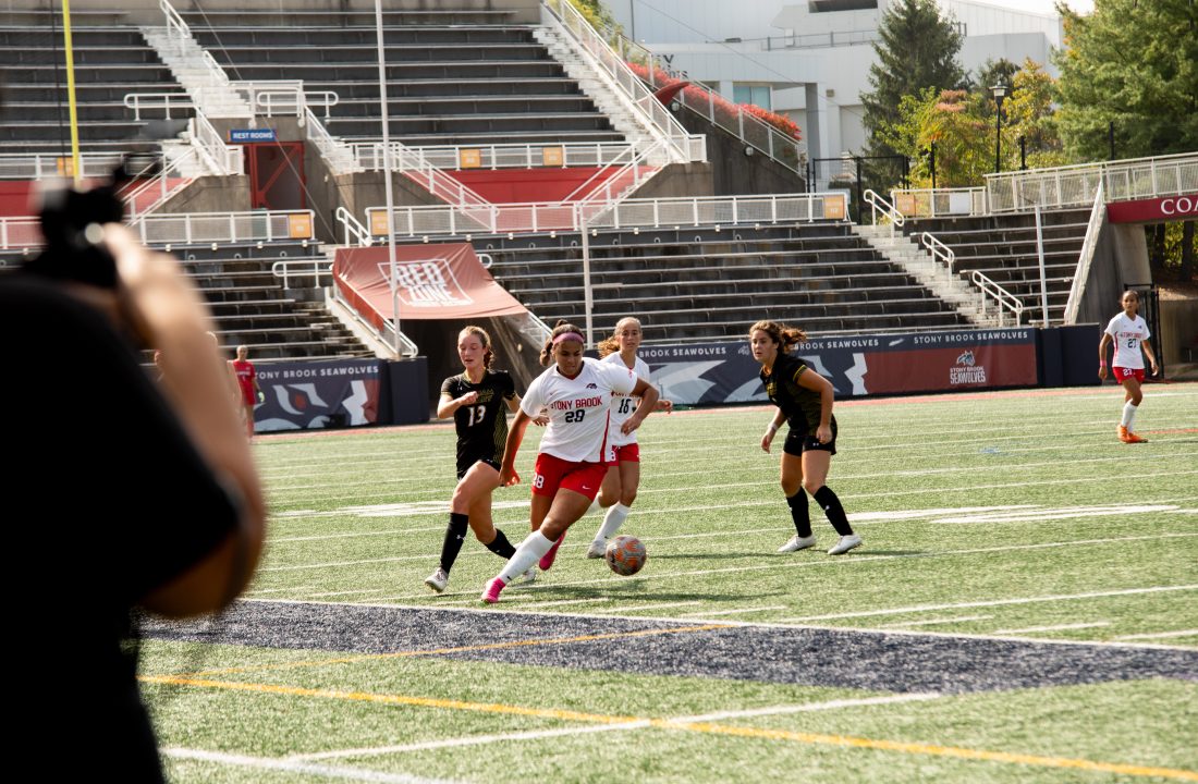 Forward Luciana Setteducate (foreground) dribbles the ball past two William & Mary defenders on Sunday, Oct. 1. Setteducate will help facilitate the Stony Brook womens soccer teams offense against Drexel. MACKENZIE YADDAW/THE STATESMAN