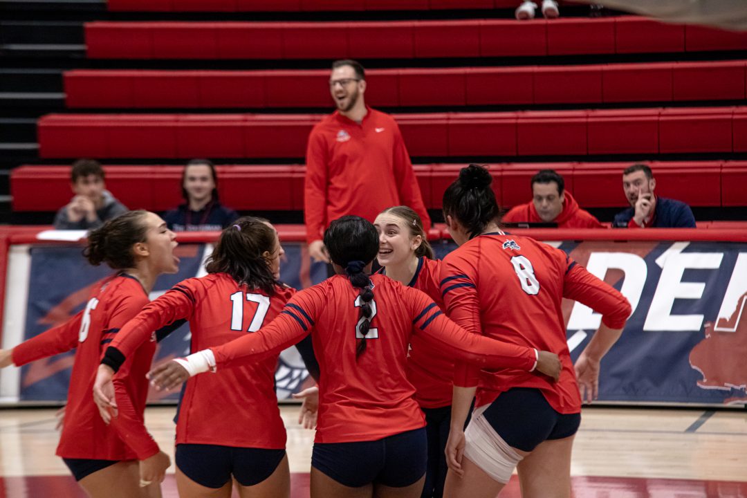 Several Stony Brook womens volleyball players celebrate a point against Delaware on Saturday, Oct. 14. The Seawolves will take on Towson in Maryland this weekend. BRITTNEY DIETZ/THE STATESMAN