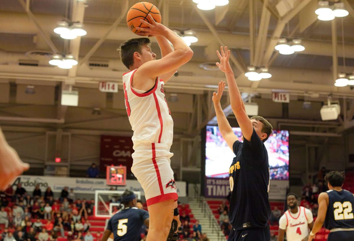 Point guard Dean Noll takes a baseline jump shot against St. Josephs University on Friday, Nov. 10. Noll co-led the Stony Brook mens basketball team with 14 points and three steals on Wednesday. BRITTNEY DIETZ/THE STATESMAN