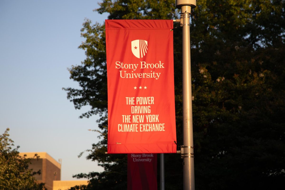 A banner hung around all of Stony Brook campus stating the University is driving the New York Climate Change. BRITTNEY DIETZ/THE STATESMAN