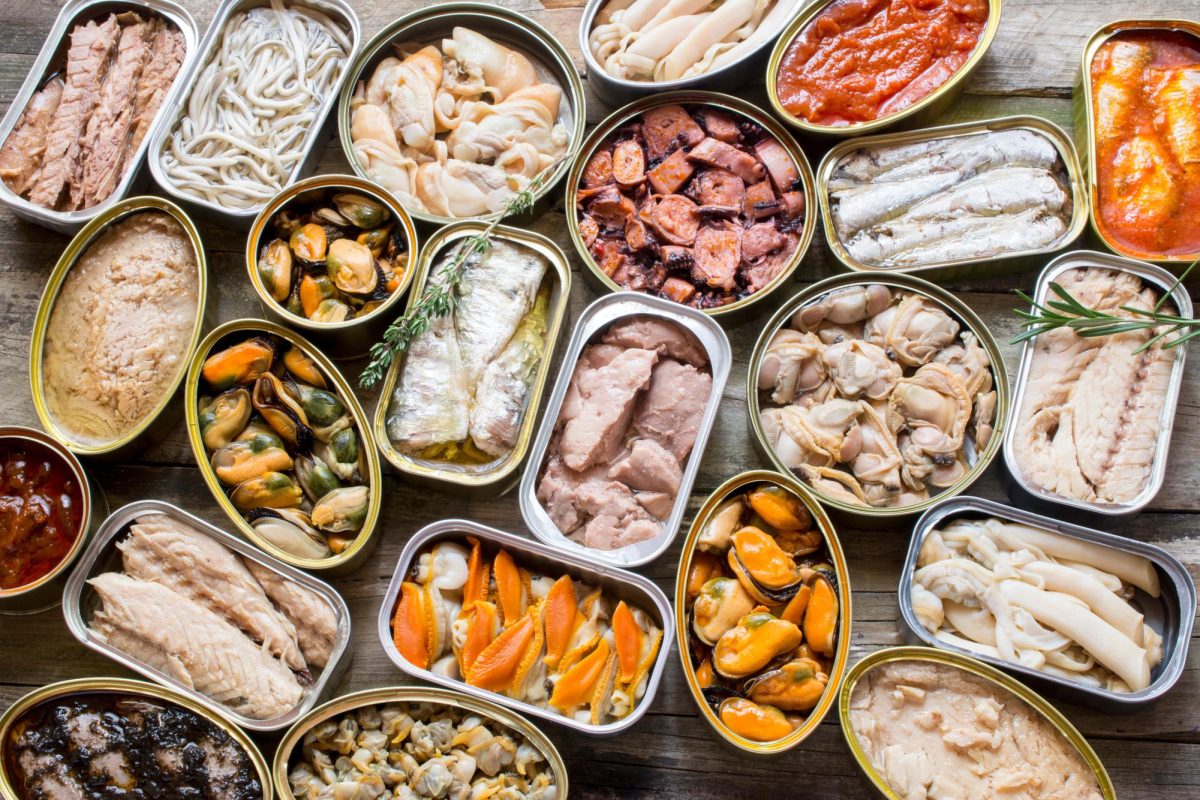 An assortment of canned fish and seafood. DULSITA - ADOBE.STOCK.COM