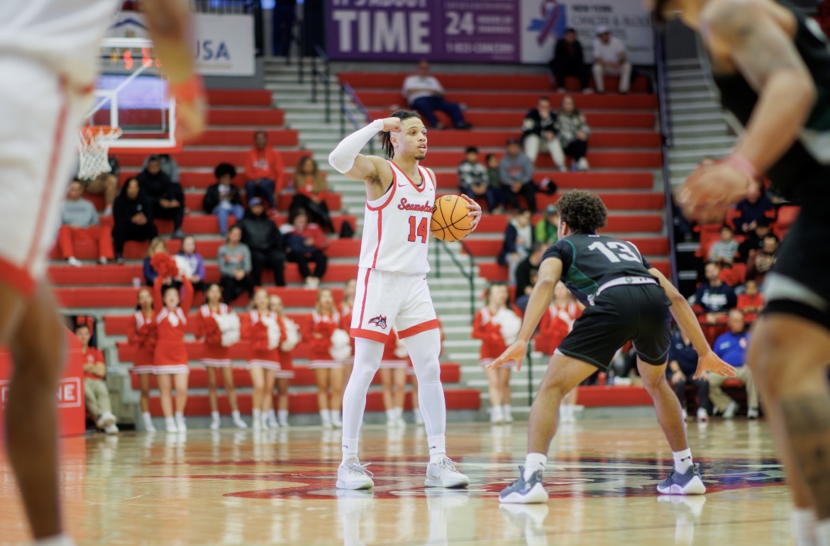 Small forward Tyler Stephenson-Moore directs traffic from half-court against Wagner on Saturday, Dec. 2. Stephenson-Moore scored 16 points in the loss. STANLEY ZHENG/THE STATESMAN