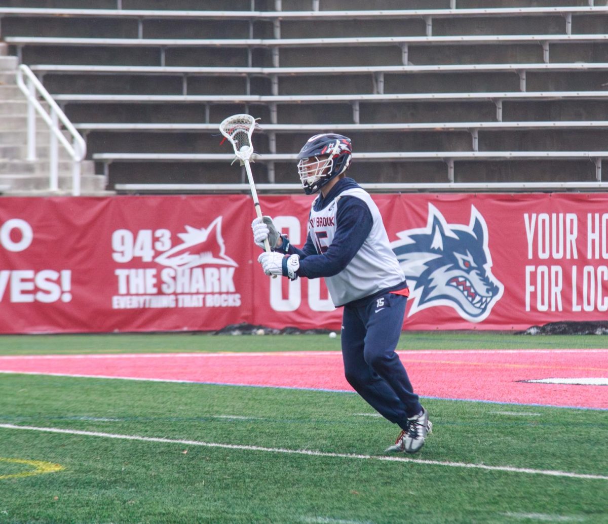Attackman Nick Dupuis looks to pass the ball from the X in practice on Wednesday, Jan. 24. Dupuis will return to the field with the Stony Brook mens lacrosse team this year after missing a year and a half. BRITTNEY DIETZ/THE STATESMAN
