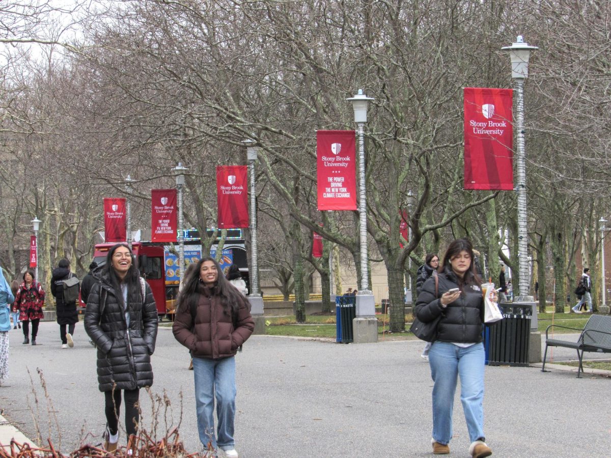 Students walking down the academic mall at Stony Brook University. ANGELINA LIVIGNI/THE STATESMAN