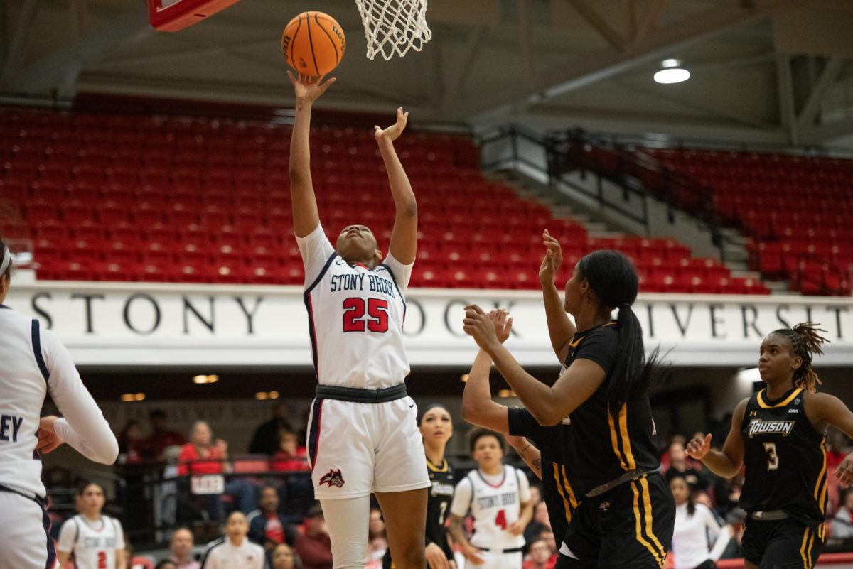 Center Khari Clark puts up a layup against Towson on Friday, Feb. 9. Clark led the Stony Brook womens basketball team with 15 points and nine rebounds on Sunday. MACKENZIE YADDAW/THE STATESMAN