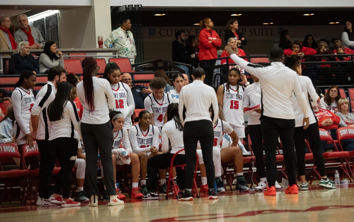 The Stony Brook womens basketball team huddles during a timeout against Towson on Friday, Feb. 3. The Seawolves will play Northeastern in Boston tomorrow at 2 p.m. MACKENZIE YADDAW/THE STATESMAN