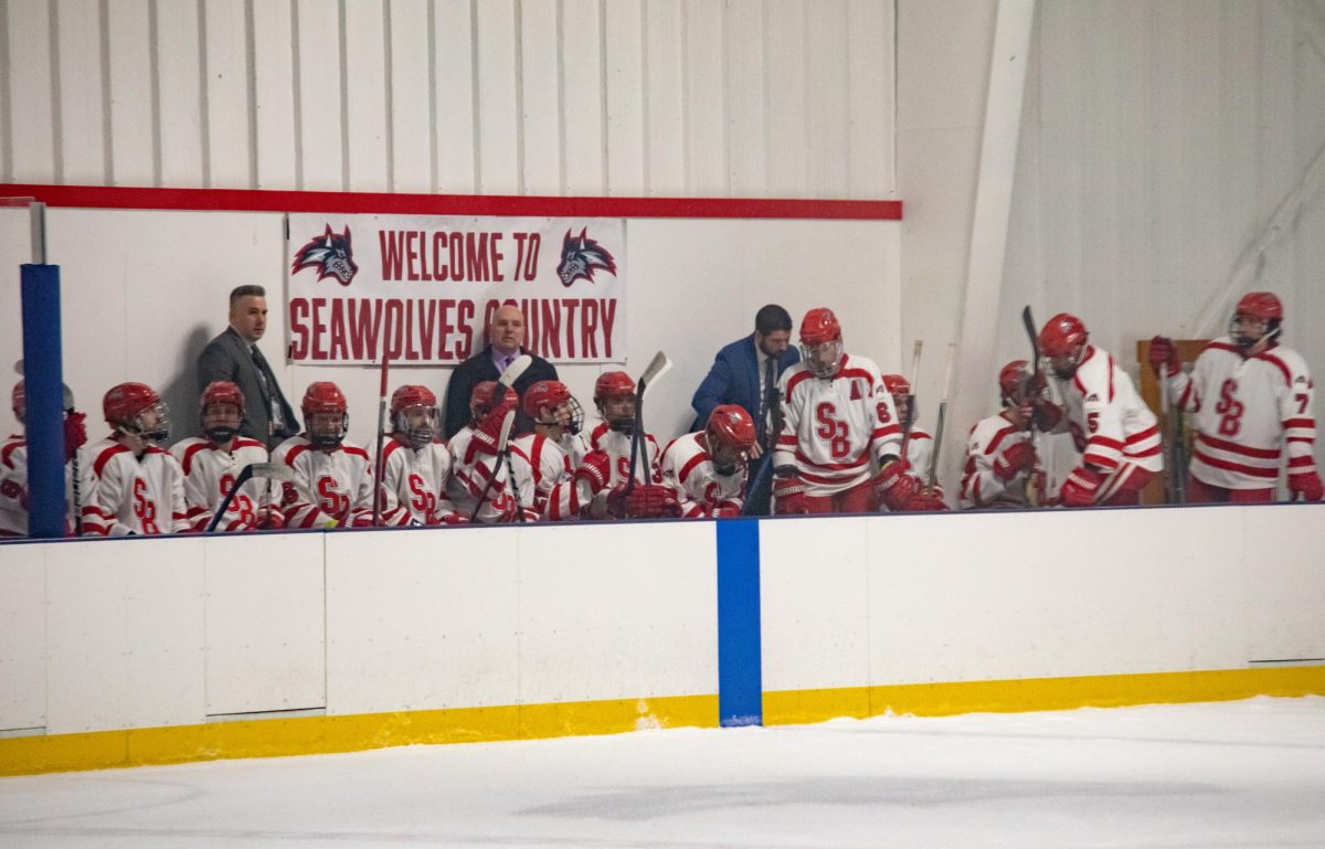 The Stony Brook hockey team gathers on the bench before the game against Drexel on Thursday, Feb. 15. The Seawolves will play Rhode Island tomorrow in the quarterfinal of the leagues playoffs. ANGELINA LIVIGNI/THE STATESMAN