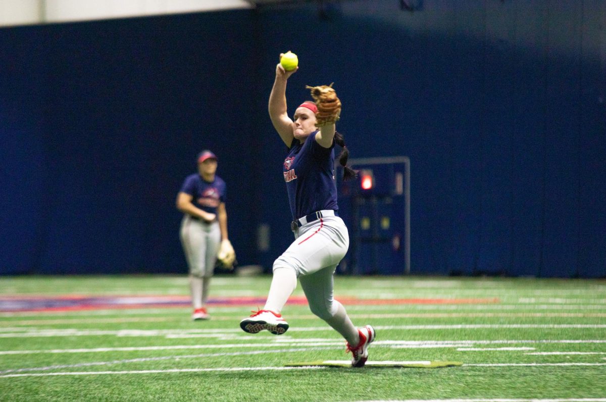 Starting pitcher Ashton Melaas winds up to throw a pitch in practice on Jan. 24. Melaas pitched well in the Stony Brook softball teams trip to California this past weekend. BRITTNEY DIETZ/THE STATESMAN