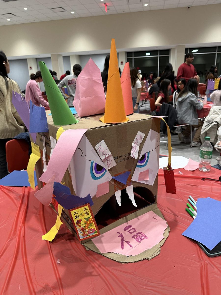 During the Asian Students Alliances Lunar New Year festival event on Feb. 7, a team crafted a lion head using a cardboard box and construction paper. SARAH CHEUNG/THE STATESMAN