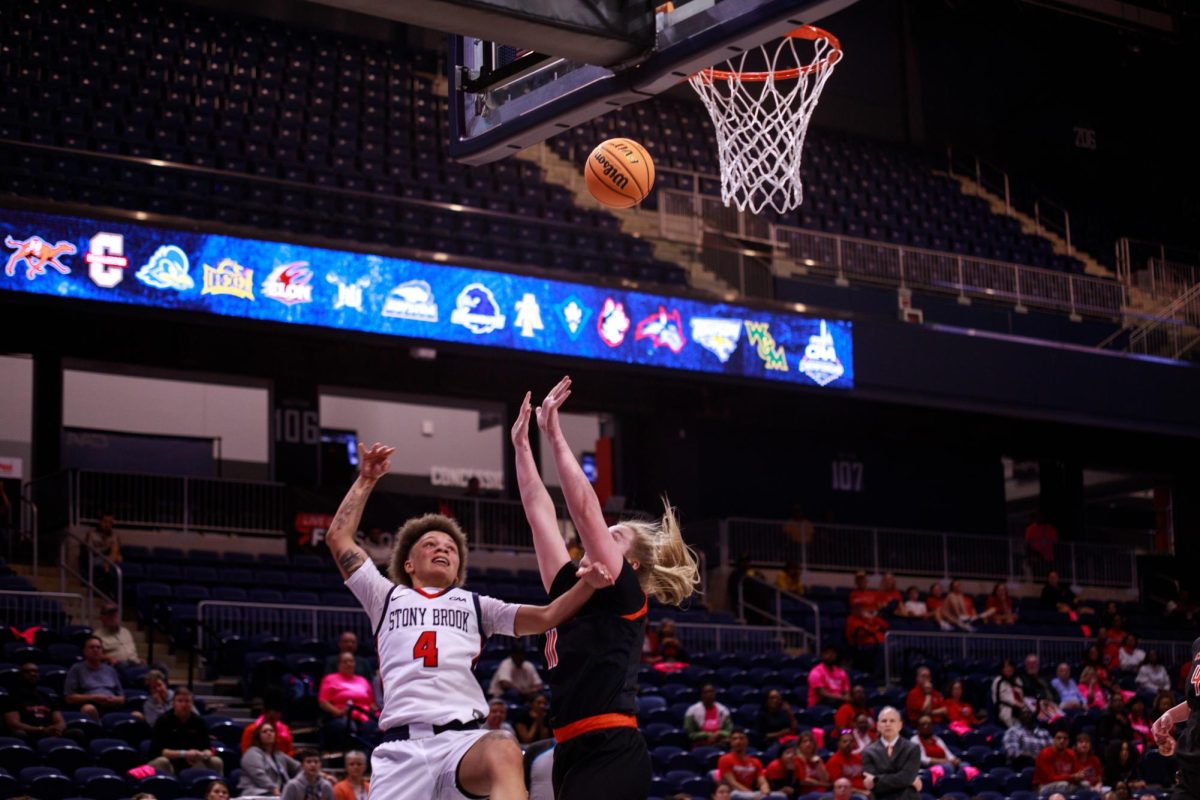 Shooting guard Victoria Keenan hits an and-one shot against Campbell on Friday, March 15. Keenan scored nine points and hauled in six rebounds in the Stony Brook womens basketball teams playoff win. ANGELINA LIVIGNI/THE STATESMAN