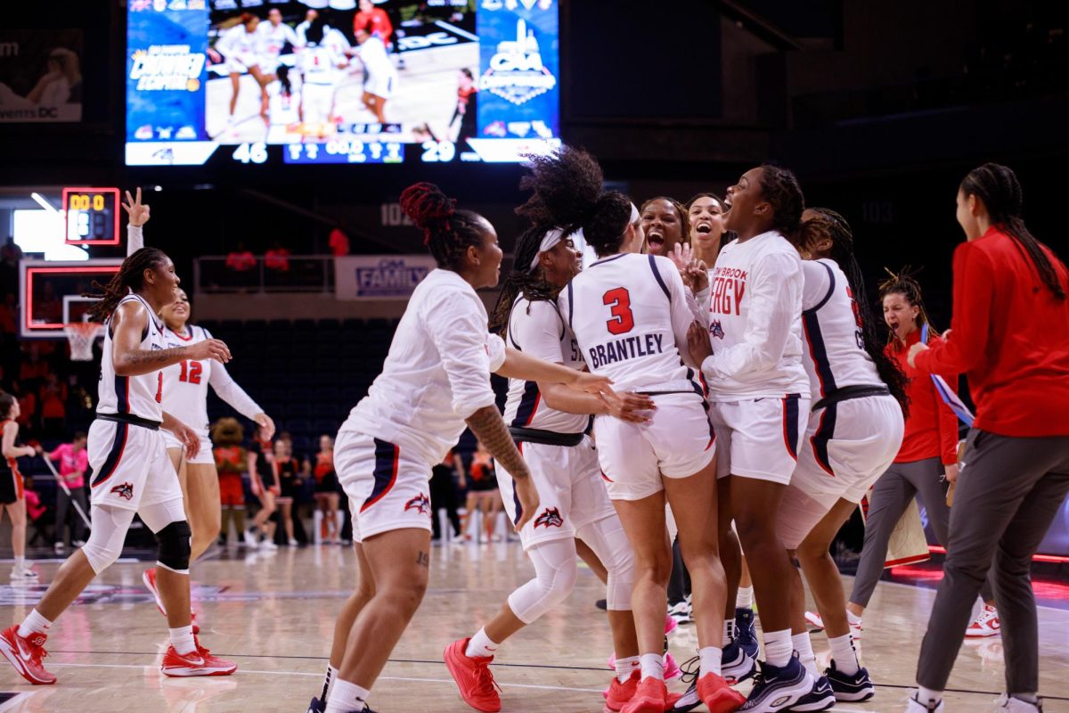The Stony Brook womens basketball team celebrates a playoff victory over Campbell on Friday, March 15. The Seawolves will play North Carolina A&T in the conference semifinals tomorrow. ANGELINA LIVIGNI/THE STATESMAN