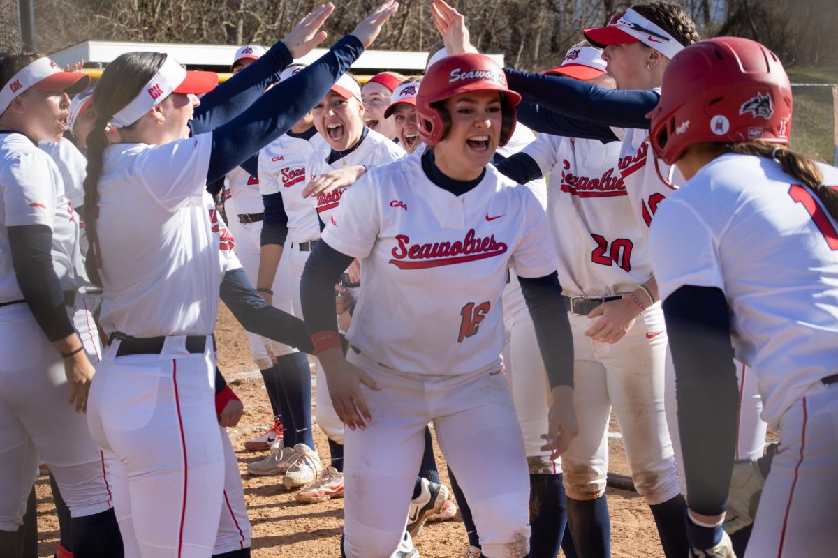 Left fielder Catherine Anne Kupinski (center) celebrates a home run against Campbell on Friday, March 8. Kupinski hit two homers in the Stony Brook softball teams first conference series of the season. BRITTNEY DIETZ/THE STATESMAN