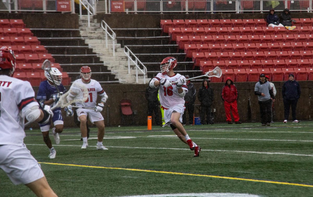 Midfielder Noah Armitage (16) winds up to take a shot against Hampton on Saturday, March 2. Armitage picked up a hat trick in the Stony Brook mens lacrosse teams win on Tuesday. BRITTNEY DIETZ/THE STATESMAN