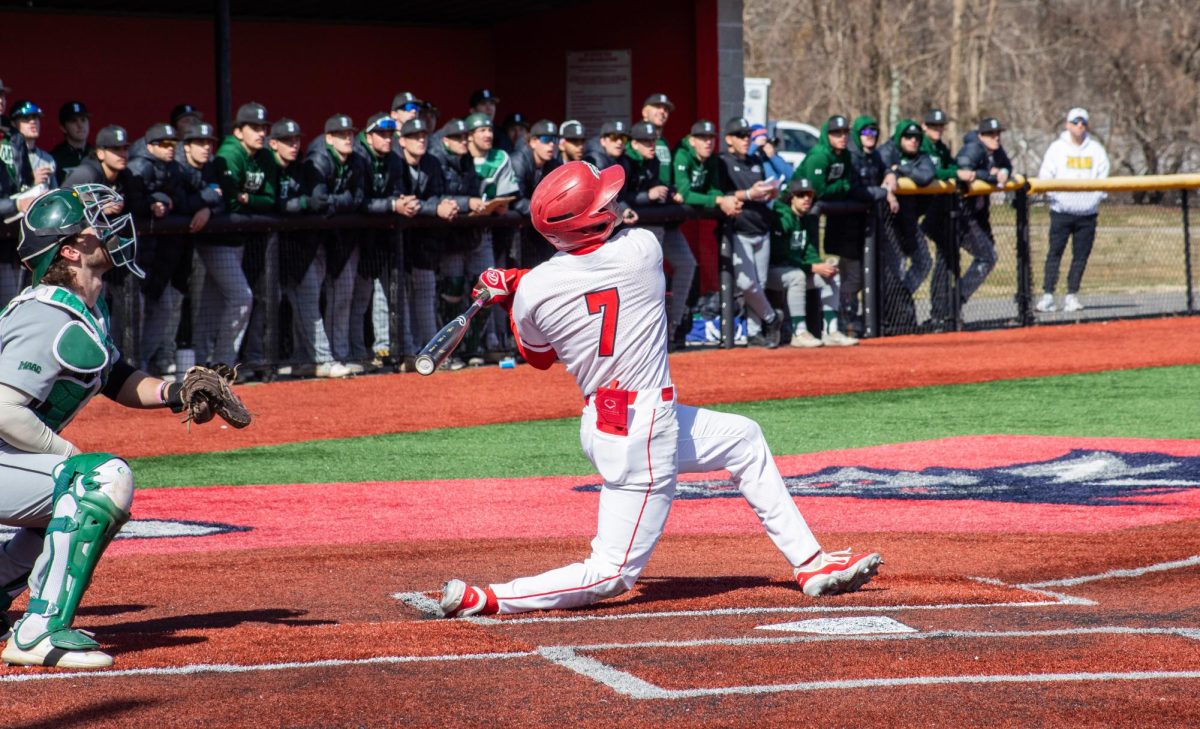 Center fielder Evan Fox takes a big swing against Siena on Friday, March 8. Fox hit a game-winning home run and had a game-tying hit this past weekend at Seton Hall. BRITTNEY DIETZ/THE STATESMAN