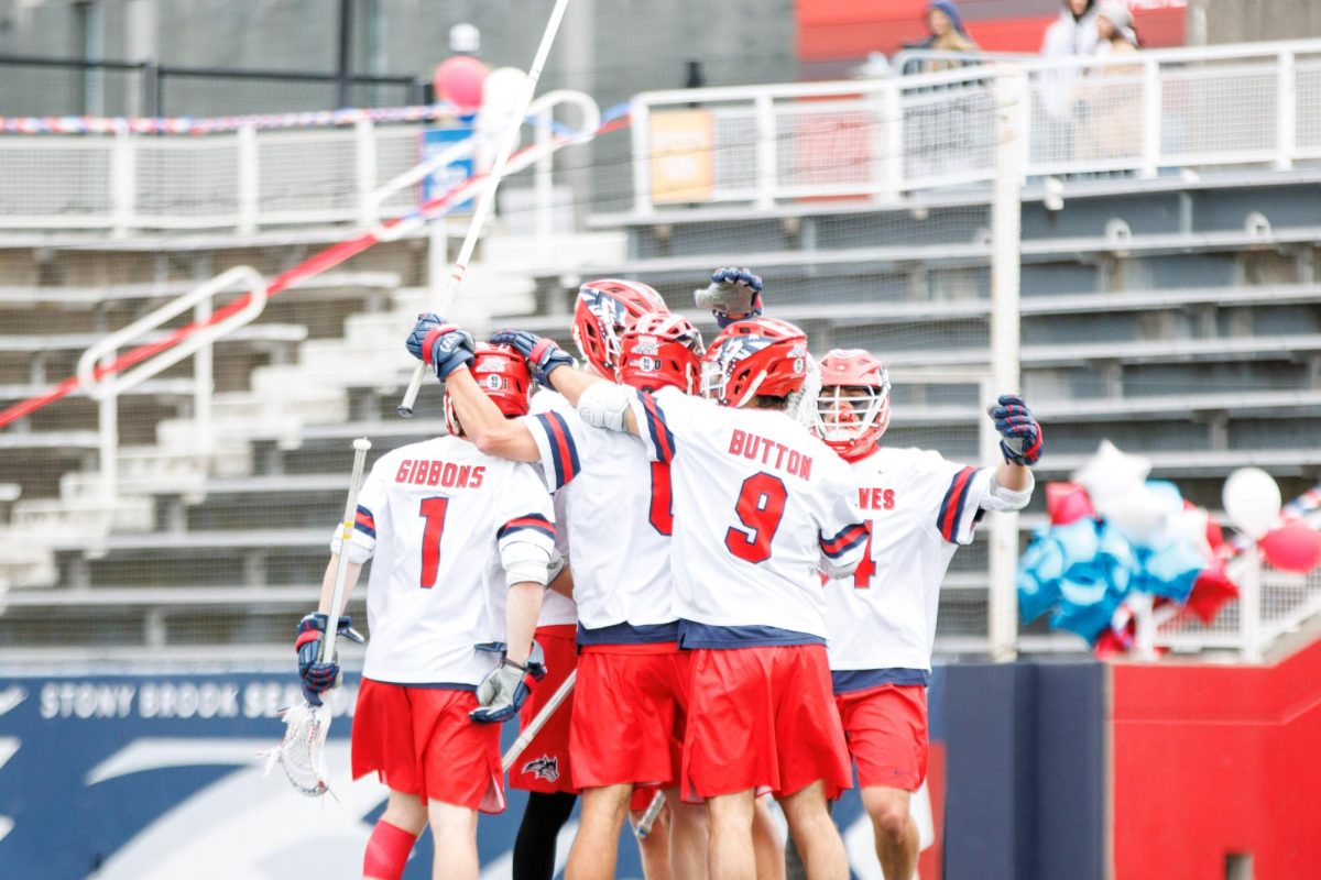 The Stony Brook mens lacrosse team celebrate a goal against Drexel on Saturday, April 6. The Seawolves won for the first time in over a month versus the Dragons.