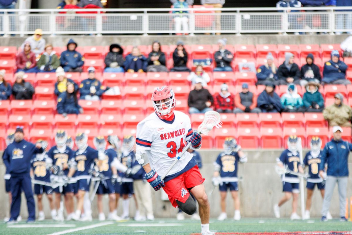 Attackman Dylan Pallonetti carries the ball against Drexel on Saturday, April 6. Pallonetti totaled three points in the Stony Brook mens lacrosse teams potential season-ending loss to Fairfield.