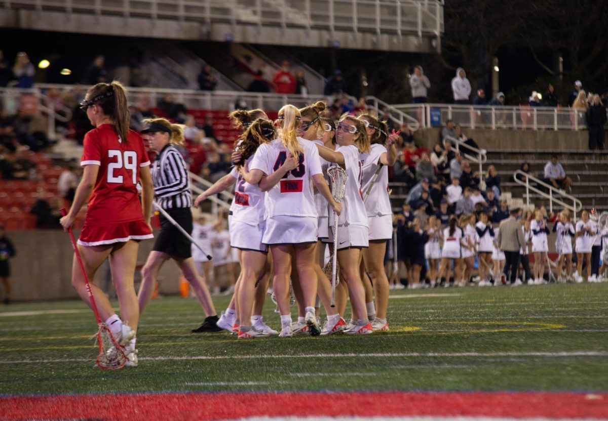 Members of the Stony Brook womens lacrosse team huddle together following a goal scored against Rutgers on Tuesday, April 9. The Seawolves will travel to Virginia to square off against William & Mary on Thursday. BRITTNEY DIETZ/THE STATESMAN