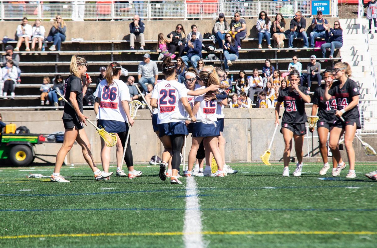 The Stony Brook womens lacrosse team celebrates a goal against Stanford on Thursday, April 25. The Seawolves will begin their conference tournament journey against Elon in the semifinals. 