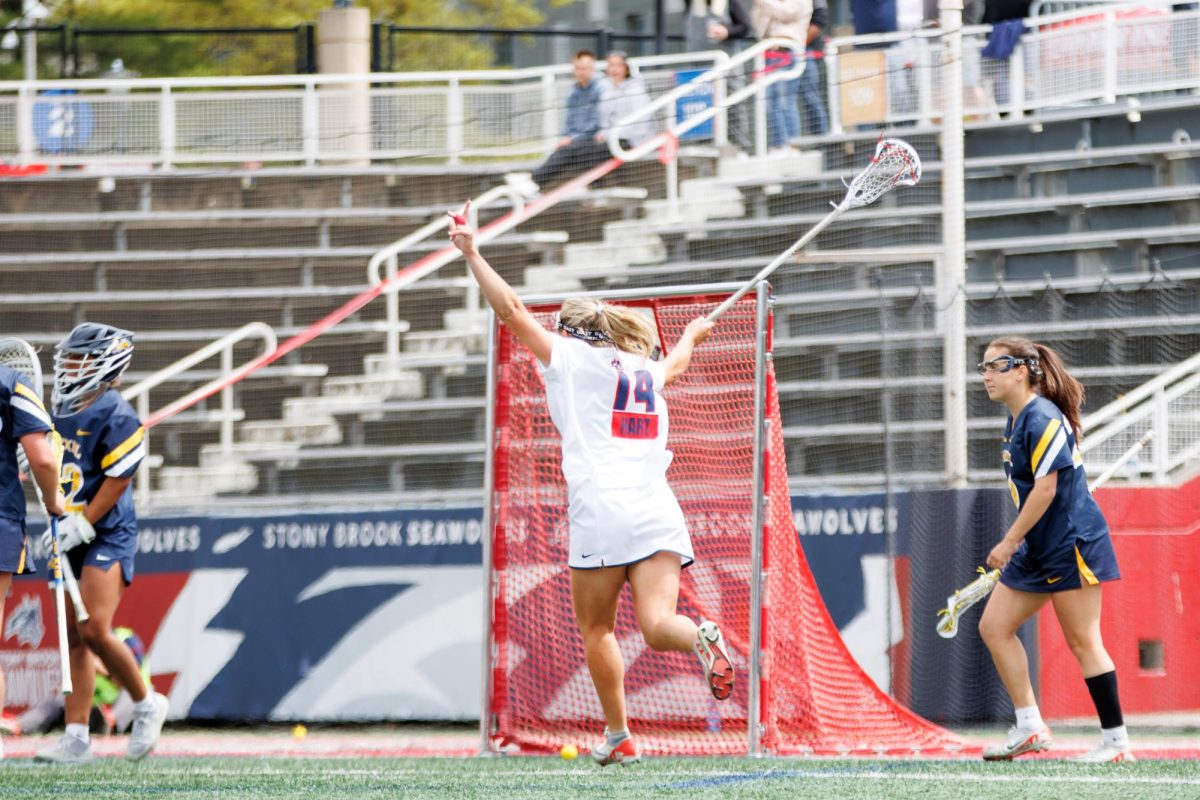 Attacker Kailyn Hart celebrates a goal by the Stony Brook womens lacrosse team against Drexel on Saturday, May 4. Hart scored a pair of goals of her own in the Seawolves CAA title-clinching victory.