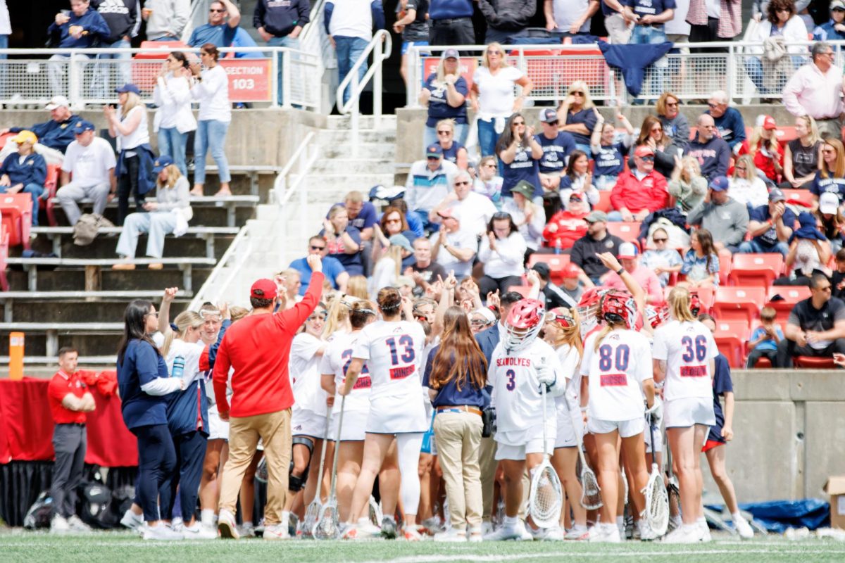 The Stony Brook womens lacrosse team huddle up during the CAA title game against Drexel on Saturday, May 4. The Seawolves will play Niagara to open their 2024 NCAA Tournament journey.