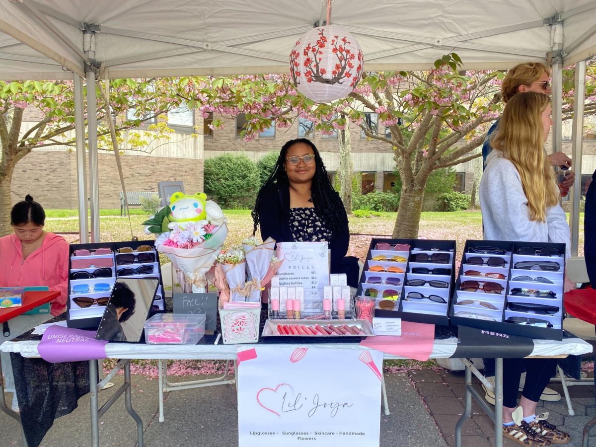 Aaliyah Barden selling her lip care line and sunglasses at the Sunset Market event on Friday, May 3. EMILY CHAO/THE STATESMAN